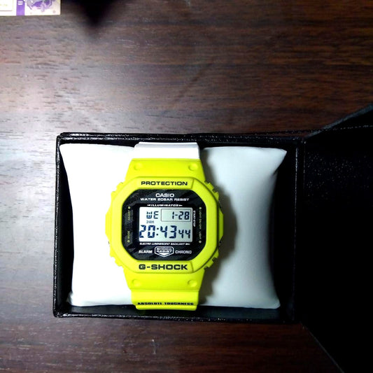 Casio G-Shock DW-5600TGA-9JF yellow digital watch with resin band and shock resistant design