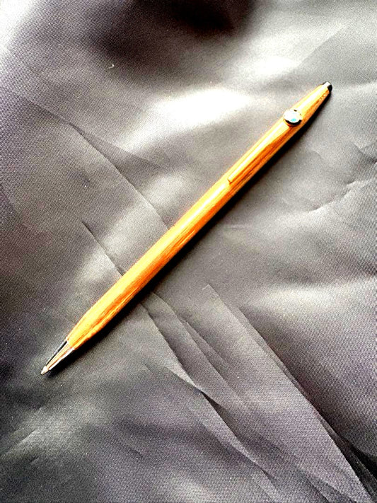 BMW Crossballpoint Pen in gold color with BMW icon and gold finish