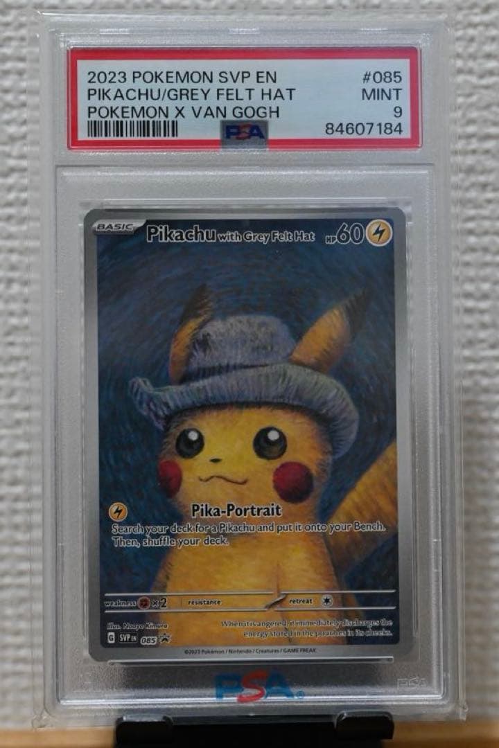 Pokemon X Van Gogh Pikachu collectible card 085 with grey felt hat in mint condition