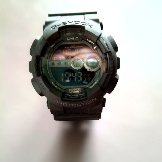 Casio G-SHOCK GD-100 digital watch with black band and bright digital display