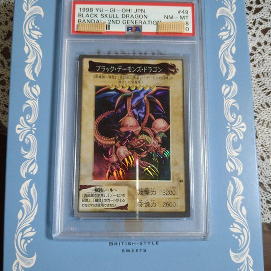 Bandai 1998 Black Demons Dragon trading card graded PSA 8 NM-MT with visible corner wear