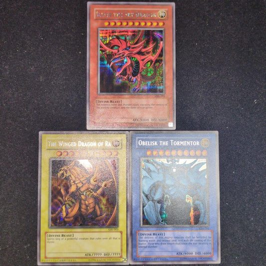 Bandai Yu-Gi-Oh GBI Secret Rare trading cards set featuring Osiris The Sky Dragon, Obelisk The Giant God Soldier, and Ra Winged Dragon of Ra