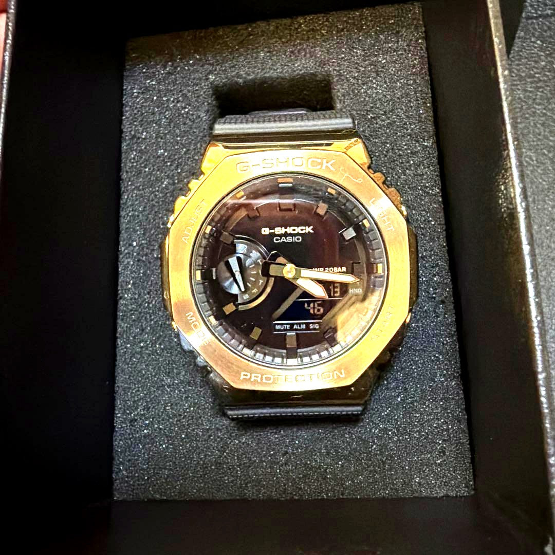 Casio G-Shock GM-2100G digital analog combination watch gold metal bezel black resin band