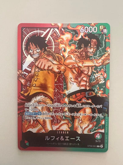 One Piece Luffy & Ace Leader Card from the card game, shown in a protective loader with rain protection