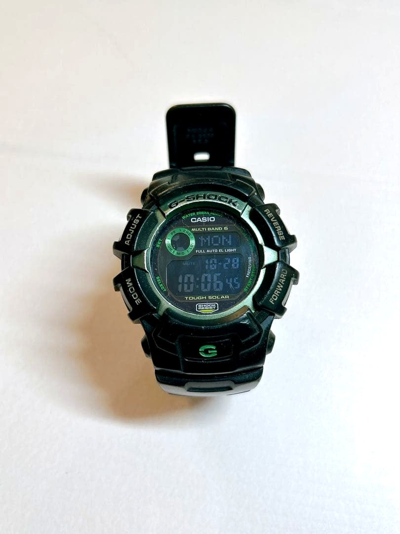 Casio G-Shock GW-2320SF watch with tough solar movement showing scratches and cracks on band and glass