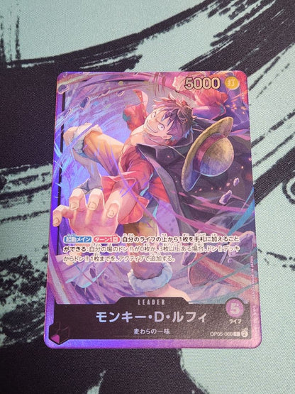 One Piece Monkey D. Luffy OP05-060 Leader Card in protective sleeve with visible condition