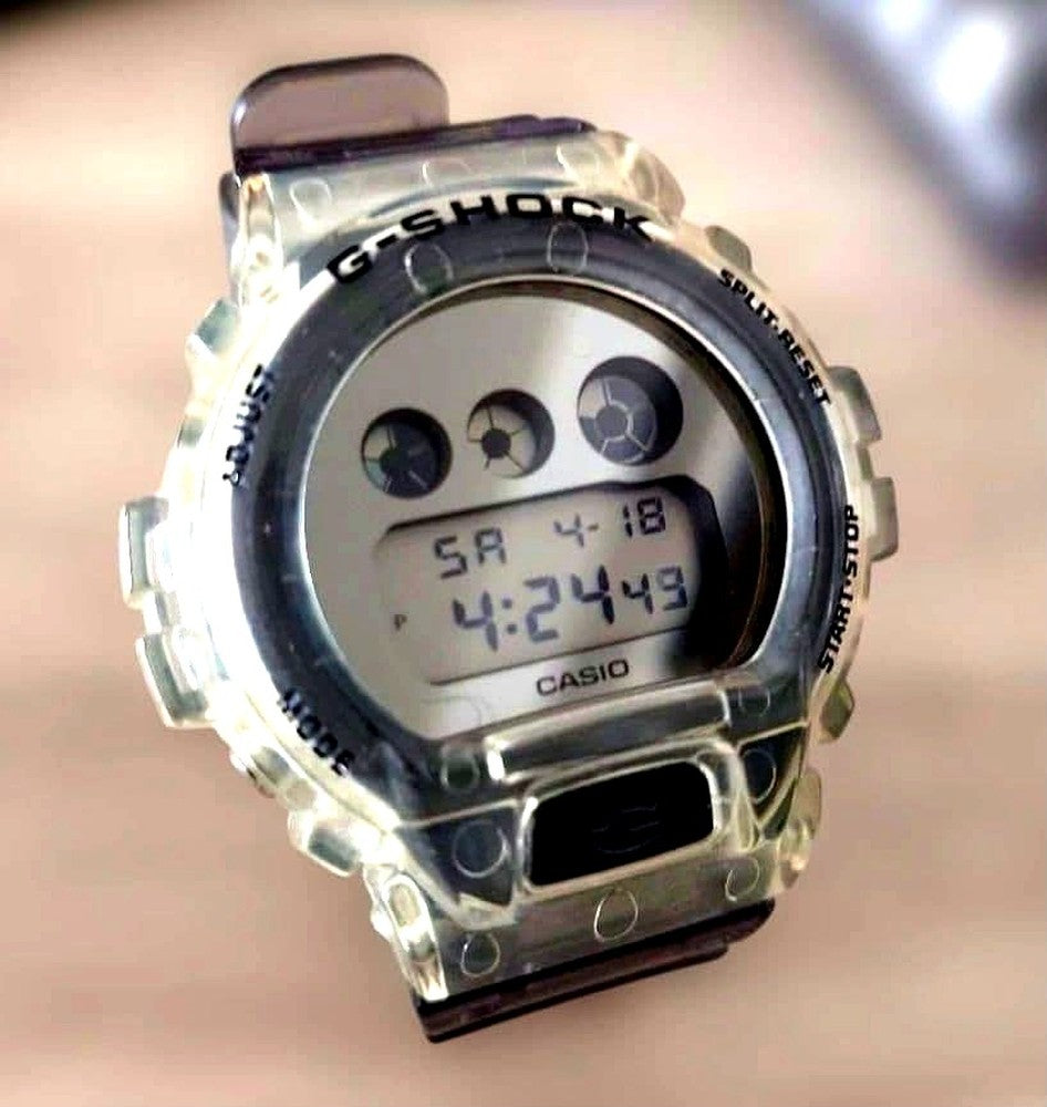 Casio G-Shock DW-6900SK quartz watch with transparent skeleton band and digital display