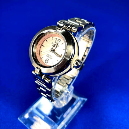 Casio MSG-10L ladies wristwatch with pink round dial and stainless steel band