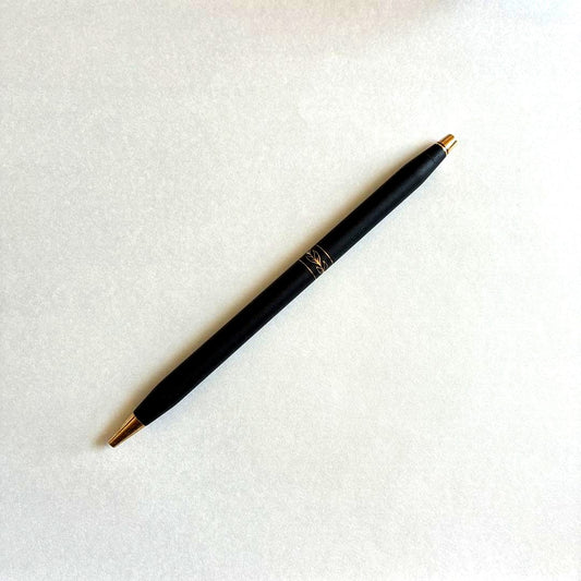 Cross Classic 2542 vintage ladies ballpoint pen with satin black body, gold trim, and intricate leaf engraving