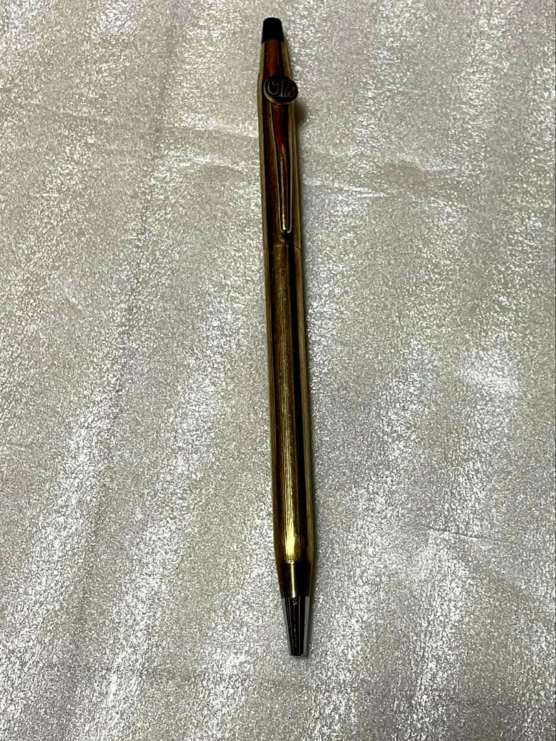 CROSS brand gold ballpoint pen with sleek design, imported from Japan