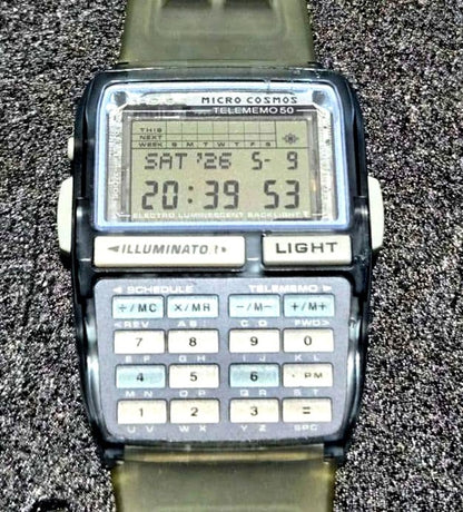 Casio Data Bank DBC-63 Micro Cosmos watch showing digital display and classic 1990s design