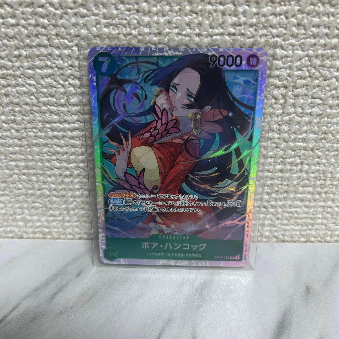 One Piece Boah Hancock SR collectible card OP16-032 from Battle of Wano set in protective sleeve