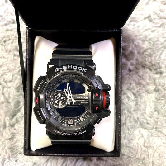 Casio G-Shock GA-400-1BJF black watch with resin and silicone band, showing used condition