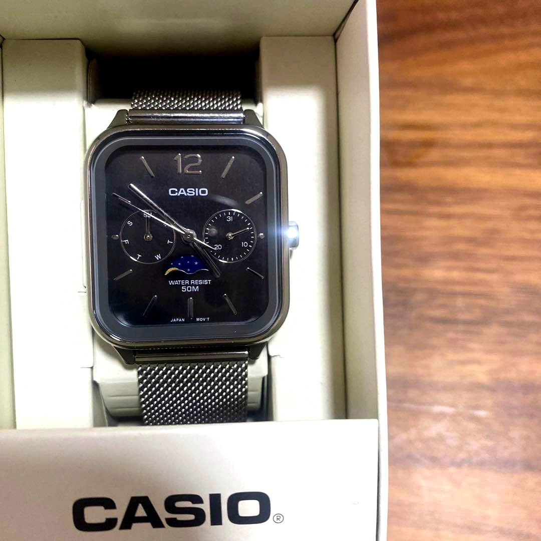Casio unisex analog watch with moon phase display and retro design showing time and moon age dial