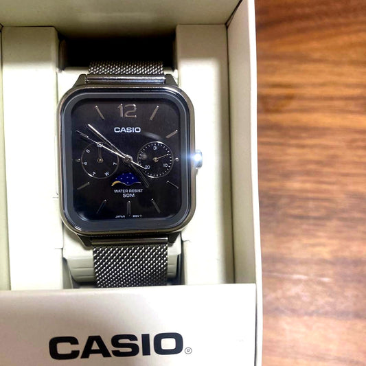 Casio unisex analog watch with moon phase display and retro design showing time and moon age dial
