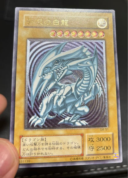 Blue-Eyes White Dragon relief card with 3000 attack power showing slight crease in upper right corner