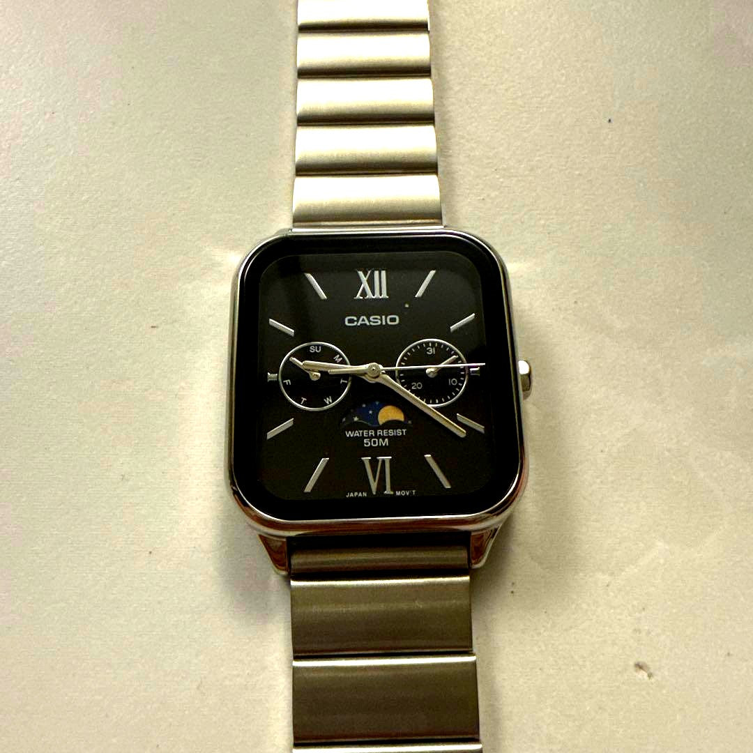 Casio MTP-M305 square quartz watch with moon phase display and multi-function features