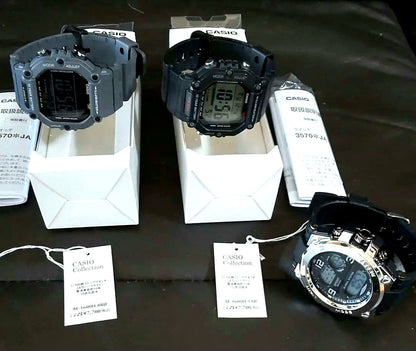 Casio AE-1600H digital watch set showing two watches and a large digital timer imported from Japan