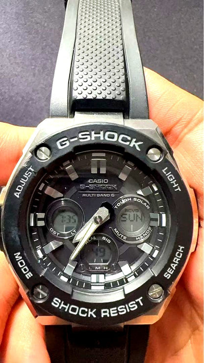 Casio G-Shock G-Steel GST-W300 men's solar-powered radio-controlled wristwatch with black and silver design
