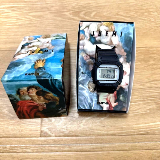 Casio Baby-G collaboration watch with black silicone band, displayed with box and warranty card