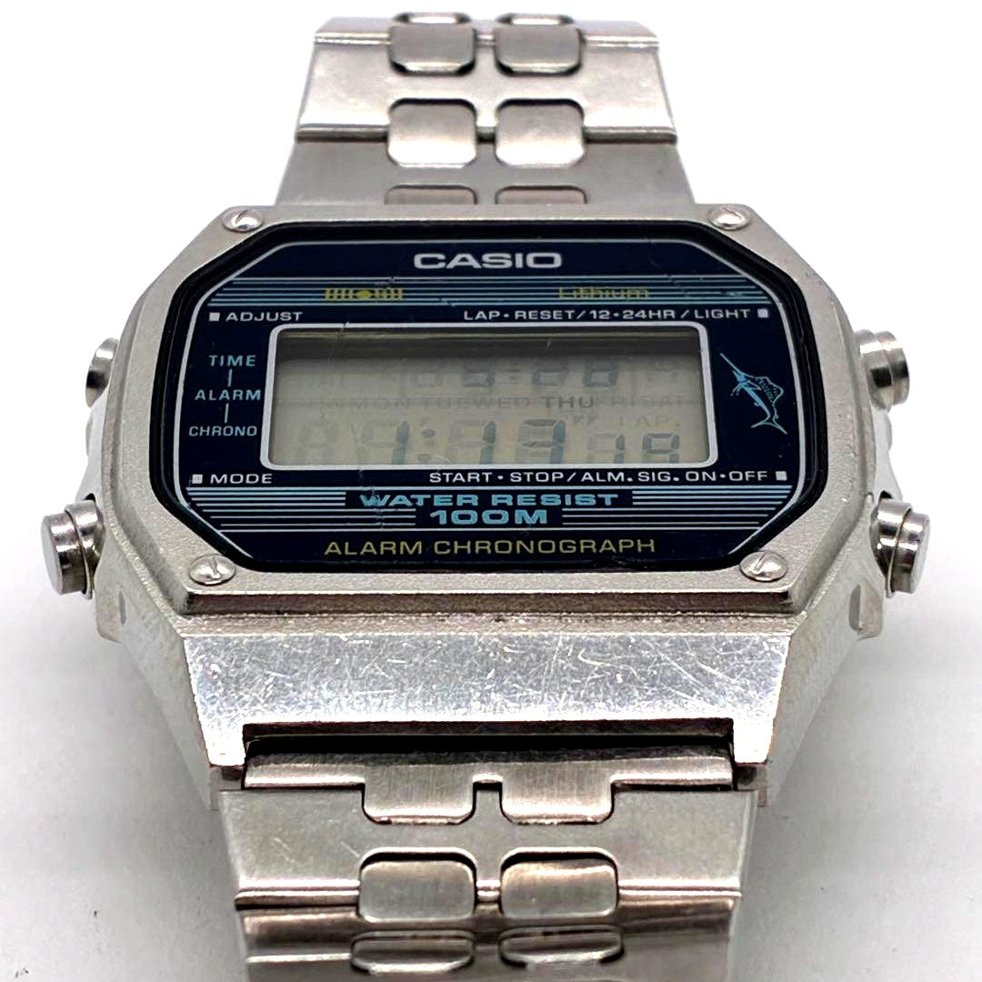 Casio W-350 Kaji Model vintage digital wristwatch with original band showing some wear and scratches