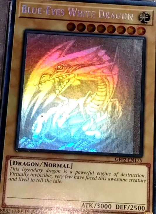 Blue-Eyes White Dragon GFTP English Error Card PSA8 with blacked-out artwork edge and shifted print