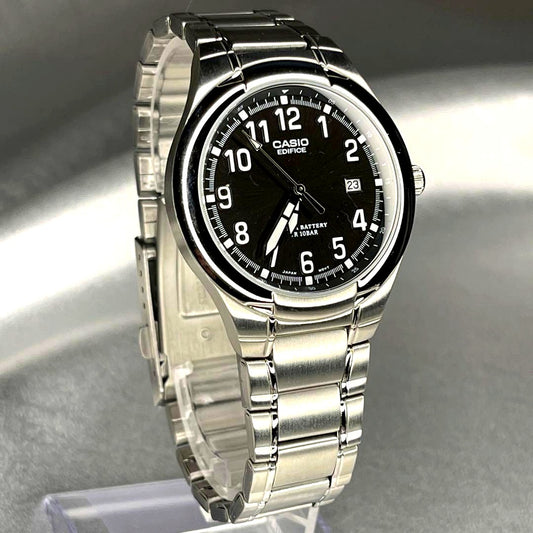 Casio Edifice EF-100 watch with silver band and brown dial on wrist