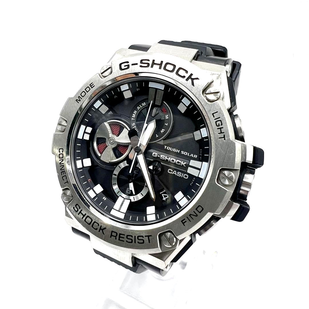 Casio G-Shock GST-B100-1AJF watch with black resin band and mineral glass face featuring Bluetooth connectivity