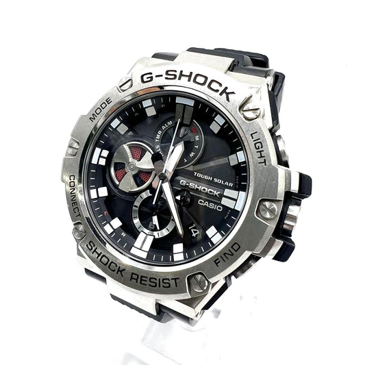 Casio G-Shock GST-B100-1AJF watch with black resin band and mineral glass face featuring Bluetooth connectivity
