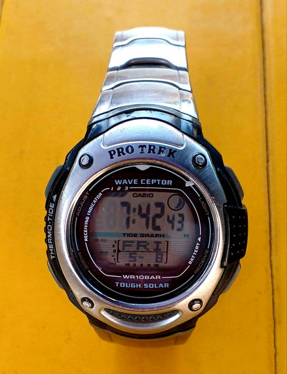 Casio Pro Trek Wave Ceptor digital watch with Tough Solar, stainless steel case, and illuminated backlight display