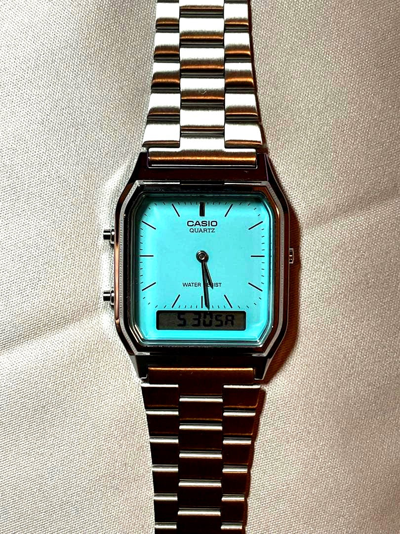 Casio AQ-230A-2A2MQYES analogue digital quartz watch with turquoise dial and silver case