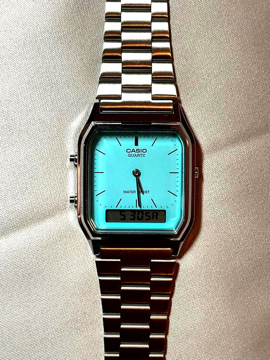 Casio AQ-230A-2A2MQYES analogue digital quartz watch with turquoise dial and silver case