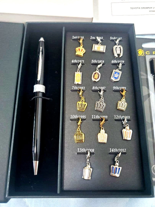 Toyota Crown Cross black ballpoint pen with 14 historic emblem charms and dedicated case