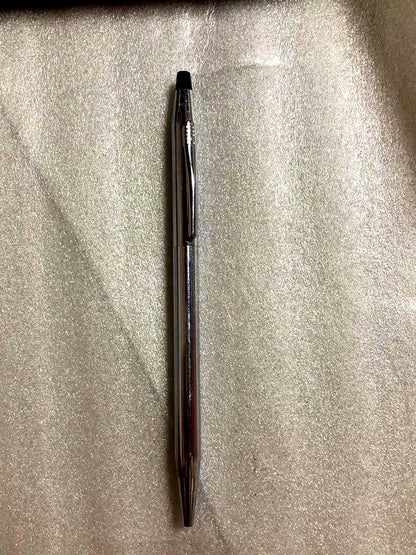 Casio Cross Pen with sleek design and smooth writing tip shown on white background