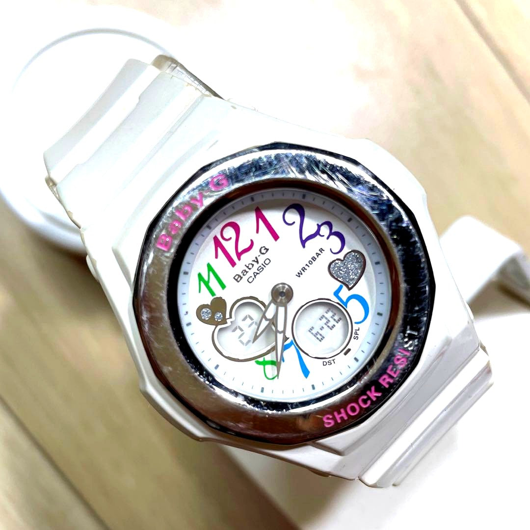 Casio Baby-G women's analog digital wristwatch with white heart design on dial and backlight feature