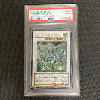 PSA9 graded Stardust Dragon relief trading card showing minor scratches and holo chips
