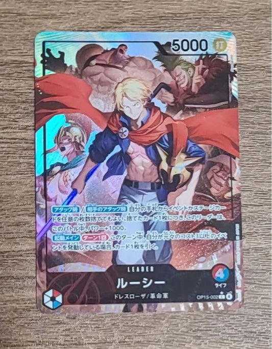 One Piece Lucy Leader Parallel OP15-002 Strike attribute trading card featuring Dressrosa and Revolutionary Army
