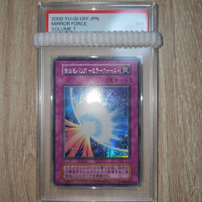 Yugioh Mirror Force Initial Secret card graded PSA 7 with Japanese text and secret rare finish