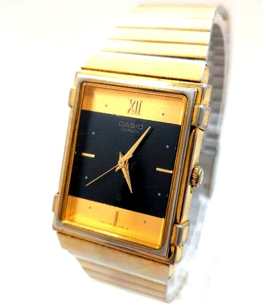 Casio MQ-728G square analog wristwatch with black dial and gold metal band Japan import