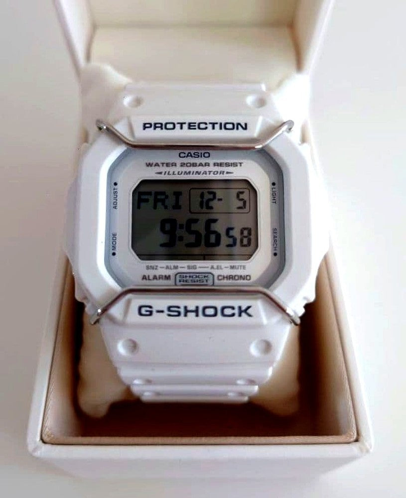 Casio G-Shock DW-5600P digital watch with black dial and white band for men, women, and kids