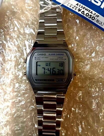 Casio A158WEA-7JF classic digital wristwatch in silver with stainless steel band, new condition, no original box