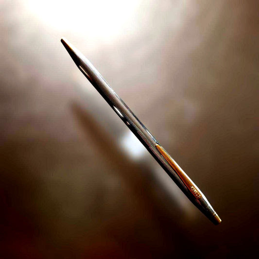 Cross Classic Century Medalist ballpoint pen with two black slim refills on white background