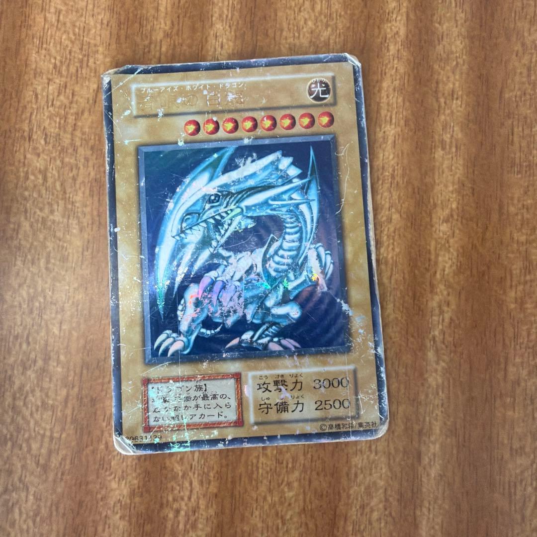 KONAMI Blue-Eyes White Dragon Japanese Yu-Gi-Oh card showing 3000 attack and 2500 defense stats