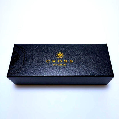 Cross ballpoint pen body shown without case or papers, sleek design suitable for writing and testing purposes.