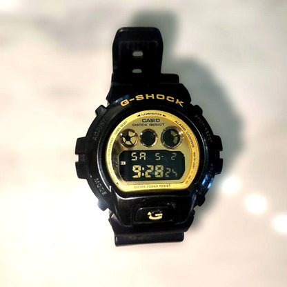 Casio G-Shock DW-6900CB Black and Gold Watch with Surface Marking Issues — Japan Import