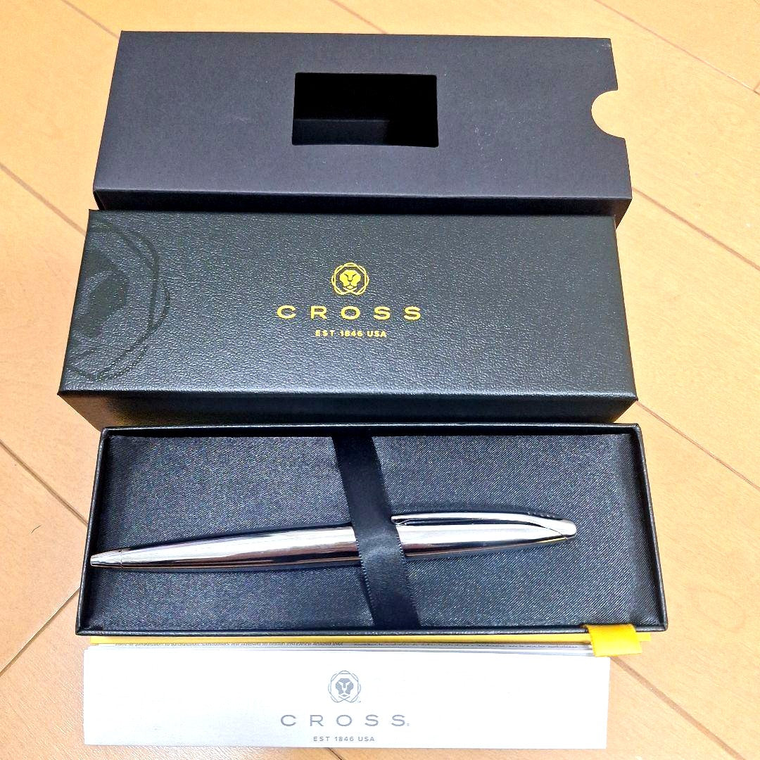 Silver Cross ballpoint pen with dedicated special case and user manual displayed