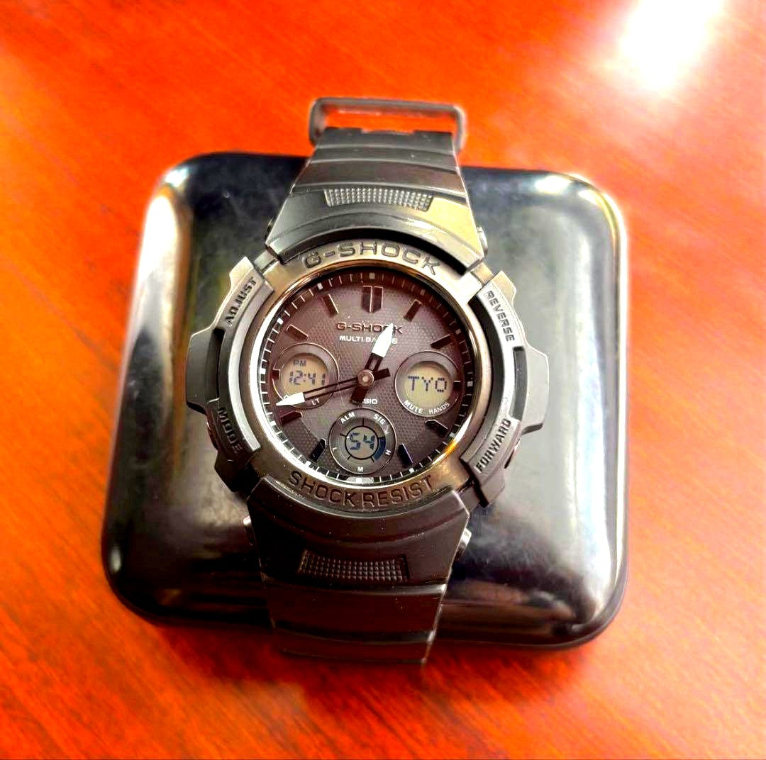 Casio G-Shock AWG-M100SBB watch Japan import showing black digital-analog display in good condition
