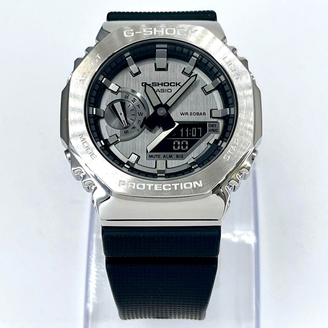 Casio G-Shock GM-2100-1AJF silver quartz watch with metal bezel and black strap