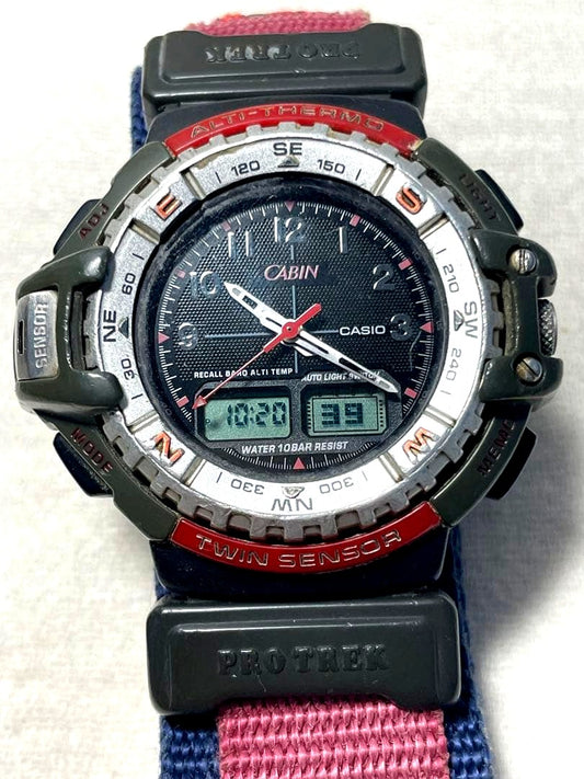 Casio Protrek Cabin PRT-70 model watch showing dial, buttons, and worn case with backlight feature