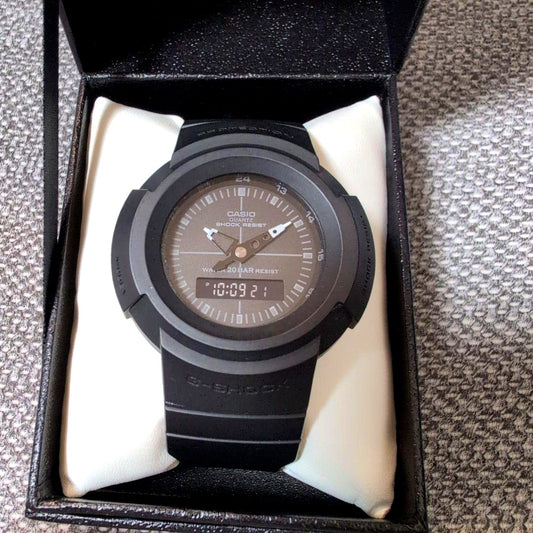 Casio G-Shock AW-500BB-1EJ retro analog-digital watch with black band, showing digital and analog display